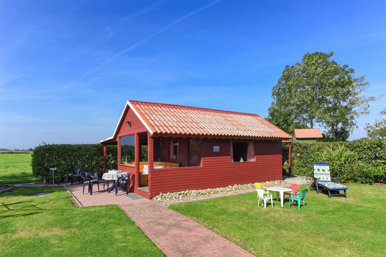 Friesenmeer Ferienwohnung Eins เบนซาซิเออ ภายนอก รูปภาพ